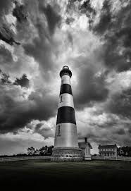 Black And White Lighthouse North Carolina Sentinel Version 2 A Close Up Of The Bodie Lighthouse In North Carolina Fast Moving Clouds Overhead Provided A Gr Moving Clouds City Architecture Lighthouse