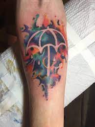 The tattoo we picked was a relatively small celtic heart looking design. Bring Me The Horizon Umbrella Watercolor Tattoo By Justin Schmidt At Dreams Collide In Lancaster Pa Japanese Tattoo Umbrella Tattoo Bmth Tattoo
