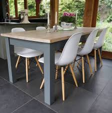Julien round walnut dining table chairs: Eames Style Table And Chairs