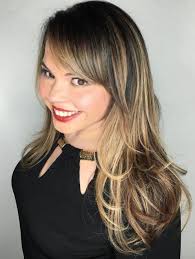 A layered cut with bangs gives the face a slightly longer look. Pin On Hair
