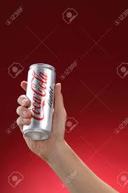 Check spelling or type a new query. Kuala Lumpur Malaysia 11th July 2016 Hand Hold A Can Coca Cola Light On Red Background Coca Cola Drinks Are Produced And Manufactured By The Coca Cola Company Stock Photo Picture And Royalty Free Image