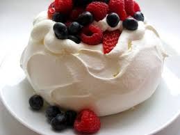 Pavlova The Perfect Light Summer Dessert Is Made Of A Hard Meringue Base Homemade Whipped Cream Fresh Berries And Pavlova Dessert Recipes No Cook Desserts