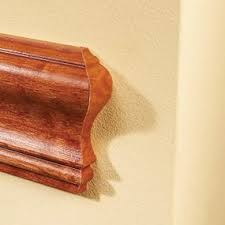 If the chair rail profile protrudes out further than the door or window casing, miter the protruding molding back at a 45° angle or form a return by mitering the end of the chair rail and attaching a small sliver of molding to it. How To Install A Chair Rail Molding Diy Family Handyman