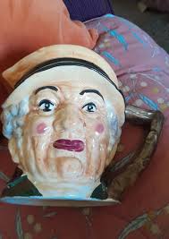 Three different 2 gallon Dillsboro jugs.