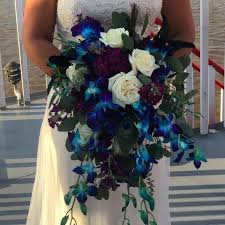 Peacock, wedding flower arrangements photos. Dana Renae Designs Our Lovely Peacock Themed Wedding Bouquet Was Exactly What Our Bride Was Looking For Love It When A Bride Has A Sense Of Adventure And Challenges Me