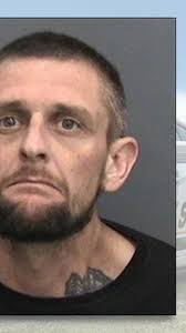 Florida man charged in axe attack