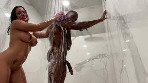 Curvy latina babe blacked in the shower