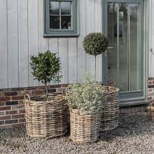 Synthetic rattan weave that is thermally bonded, making it this funky bude large outdoor rattan storage box has been created for indoor or outdoor use all year round in a completely synthetic water hyacinth weave. Large Round Wicker Baskets For Log Storage And Planters Motta Living
