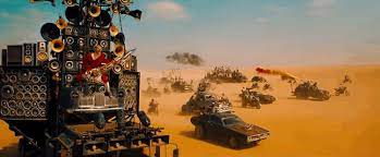 Leading us into battle was coma the doof warrior. Mad Max Fury Road Who Is The Guitar Guy
