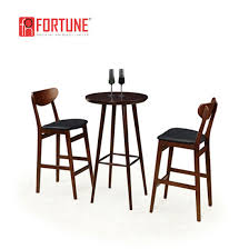 A two seater pub table set is great for a small home or apartment for a single person or a couple without children, while a pub table set that seats four is a better bet for larger spaces or a home with more family members. China High Height Restaurant Bar Wooden Bar Table And Stools For Sale China Bar Table And Stools Bar Table Chairs