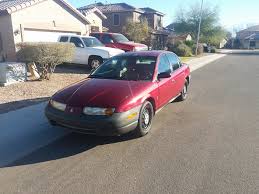 Image result for Bright Red 2000 Saturn