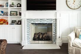 The resulting surround provides a uniform, singular look. Glass Tile Fireplace Surround Design Ideas