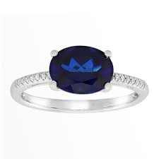 Diamond tiered flower ring sale $80.00. Created Oval Blue Sapphire Ring With Diamond Accents In 10k White Gold Oval Blue Sapphire Ring With Diamonds Welry