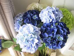 The hydrangeas that bloom in a range of colors from pink through blue are typically mopheads or lacecaps and these are the hydrangeas you want to have in your garden in order to get that perfect blue bloom. Silk Hydrangea Flower 10 Stem Real Size Artificial Hydrangea Etsy Artificial Flowers Wedding Silk Hydrangeas Wedding Table Centerpieces