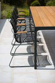 Arhaus' outdoor dining chairs and bar stools are the perfect way dine in the summer. Click Arm Chair Outdoor Dining Chairs Outdoor Chairs Indoor Design