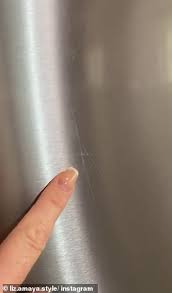I think it's holding up ok. How To Remove Scratches From Your Stainless Steel Fridge Daily Mail Online