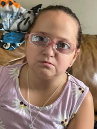 Middletown group photo of girl with wise eyes