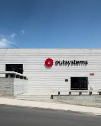 In addition, the thoughtfully designed exterior has been inspired by the architecture of arts and crafts movement, featuring sturdy stone columns on stone bases, lap siding and cedar shingles. Outsystems Office Carlos Delgado Pinto Archello
