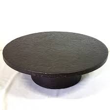 The table is large enough for several people to enjoy. Brutalist Faux Slate Round Coffee Table 1970s 97342