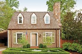 It sits in the middle of a field and has very little vegetation around it. How To Pick The Right Exterior Paint Colors Southern Living