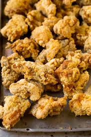 In a large wok add oil and heat to 350° and with care place into one half of the chicken and deep fry to a golden brown and place onto a rack and repeat this step. Korean Fried Chicken Dinner At The Zoo