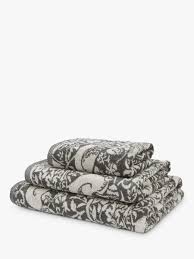 One bath towel, one hand towel, and one washcloth have a multicolored vine pattern, while the remaining three pieces. Patterned Towels John Lewis Partners