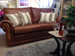 Cat claws may snag on the fabric weave of a sofa, but your leather couch should be safe if you keep a scratching post close by. Sofa By Ralvern Cannock Sofa Makers Executive Ascot Tan Leather Ralvern Upholstery Bespoke Sofas Reupholstery