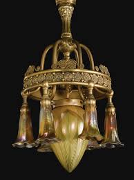 Check spelling or type a new query. Tiffany Studios Seven Light Chandelier The Central Shade Engraved L C T Each Lily Shade Engraved L C Art Nouveau Lighting Art Nouveau Lamps Antique Lighting