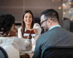 Image of Travel agent helping customer