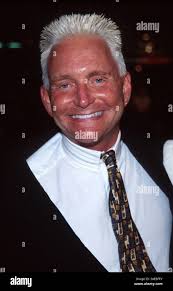Eric Douglas, son of actor Kirk Douglas, poses outside the federal  courthouse in Newark, N.J., with his dog, Yume, in this March 18, 1996  photo. Douglas pleaded guilty