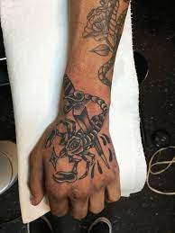 What if those tattoos are a meaning towards the movie: Fuck Yeah Hand Tattoos