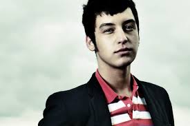 Seeing Happiness in Ambiguous Facial Expressions Reduces Aggressive  Behavior