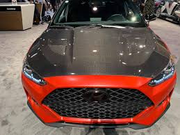 Built to compete against hot hatch kings like honda's civic for the 2019 model year, hyundai introduced a second generation veloster with refined bodywork, suspension components, and features. Ts Style Carbon Fiber Hood For 2019 2021 Hyundai Veloster Veloster Turbo Veloster N Socal Garage Works