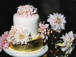 Combed buttercream wedding cake with floral burst. Gold Cake Wedding Cake Floral Wedding Cake Simplistic Cake White And Gold Cake Floral Design Wedding Photography Kristin Banta Events Los Angeles Based Luxury Event Wedding Planner