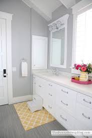 Contemporary primary bedroom with gray walls and hardwood floors topped by a gray rug. Girls Bathroom Decor The Sunny Side Up Blog Gray Bathroom Walls Light Grey Bathrooms Grey Bathrooms