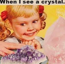 Is anyone able to identify this crystal please? It has 3 enhydro's in it, I  have managed to get one of them