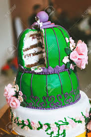 Shop quality cake toppers that come in all sorts of different shapes or colors and feature different personalized options. Green Purple Wedding Cake With Pink Flowers In An Oriental Style Stock Photo Picture And Royalty Free Image Image 54810784