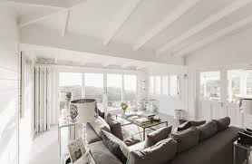 Browse living room decorating ideas and furniture layouts. Sunny Luxury Home Showcase Living Room With White Wood Beam Vaulted Ceiling Building Modern Stock Photo 199364672