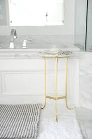 Pick up some plush towels and bath sheets for master and guest bathrooms. Layered Bath Mats Transitional Bathroom
