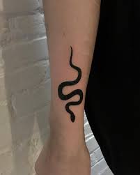 Black And Gold Snake Tattoo 1 627 Likes 6 Comments Cate Catewebb On Instagram Simple Snake From Yesterday Tattoos Snake Tattoo Small Snake Tattoo