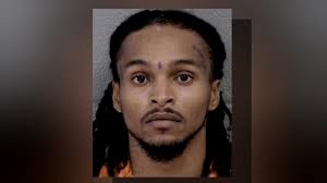 Another violent crime suspect