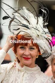 40025574-Ladies Day at the Sky Bet Ebor Festival 2024 held at York  Racecourse. Pictured Andrea Hall, Isabella Koblenc, and Suzanne Critchley  having a drink in the champagne bar. Picture By Yorkshire -