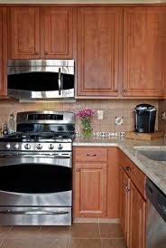 10 Kitchen Transformations Where Only The Cabinets Changed Updated Diy Kitchen Countertops Kitchen Transformation Kitchen Design Small
