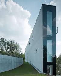 Both the kitchen and the living room would benefit from much wider windows. Triangle House E2a Piet Eckert Und Wim Eckert Architekten Archello