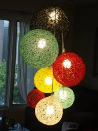 A Cluster Of Yarn Ball Lights Diy Chandelier Diy Pendant Light Diy Lighting