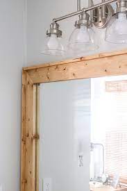 Vanity lights for mirror diy invitations. Diy Mirror Frame Frame Your Bathroom Mirror For Less Than 20