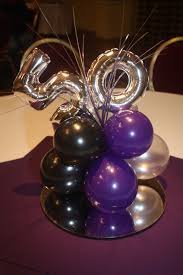 A 50th birthday is a reason to celebrate and the perfect present will add to a great celebration. Pin By I Heart Balloons On 50th Birthday Celebrations Decor Balloons 50th Birthday Party Decorations 50th Birthday Centerpieces Birthday Centerpieces