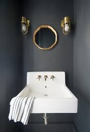 You can see another items of this gallery of. This Small Black And White Powder Room Features A Wall Mount Sink With A Polished Nickel Faucet Boldly Sta Black Powder Room Powder Room Small Powder Room Sink