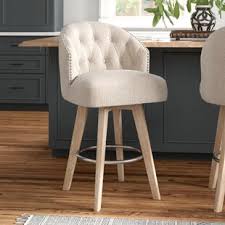 Showcasing an intricately designed backrest, a beautifully carved seat apron, flared legs, and single welt cord trimmed upholstery, the lagrange will add a special design element to your living area. Bar Stools Counter Stools Joss Main