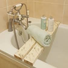 Aside from awkwardly reaching your body halfway out of the bath to reach your snacks, there is also the issue of height. Wooden Over The Bathtub Distressed Rack Bridge Bath Caddy Tray White The Bath Rack